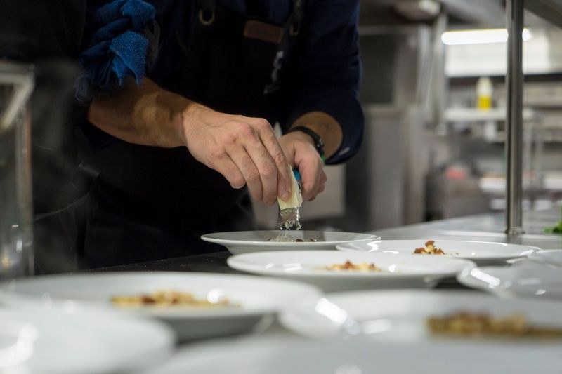 Refined corporate catering spread by BOURNE TO COOK